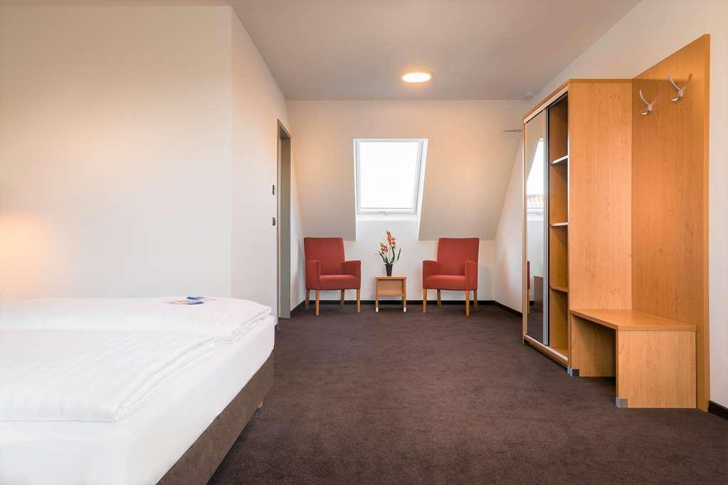 Novum Hotel Bruy Штутгарт Номер фото