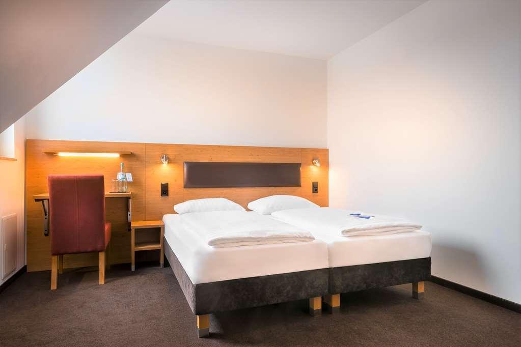 Novum Hotel Bruy Штутгарт Номер фото